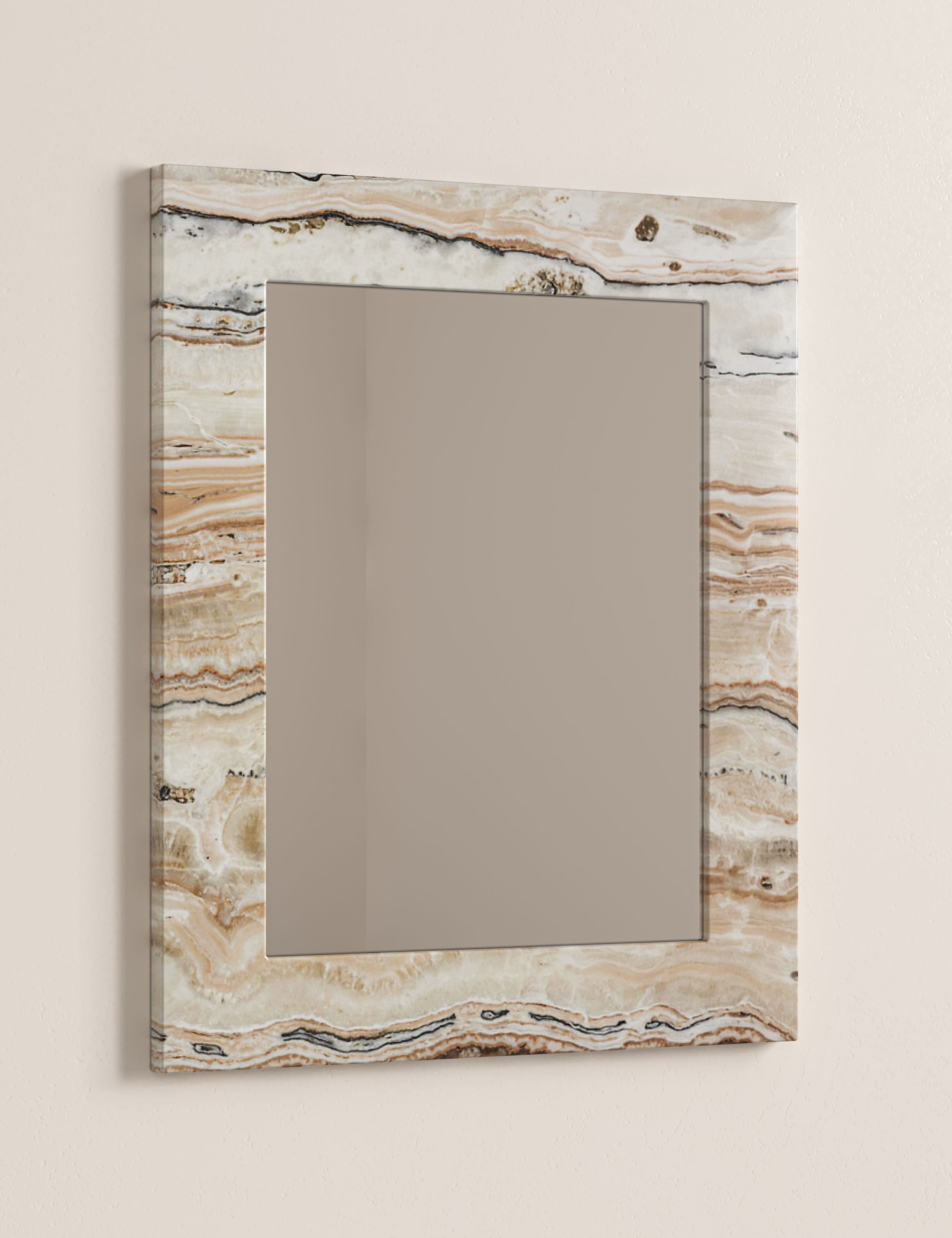 Luxury wall mirror framed in Desert Linea Onyx natural stone with soft sand tones and flowing horizontal veining
